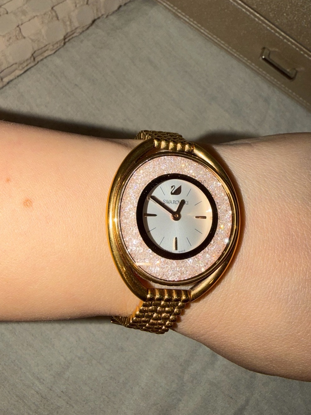 Swarovski Gold Tone Watch with Pink Crystal Dial